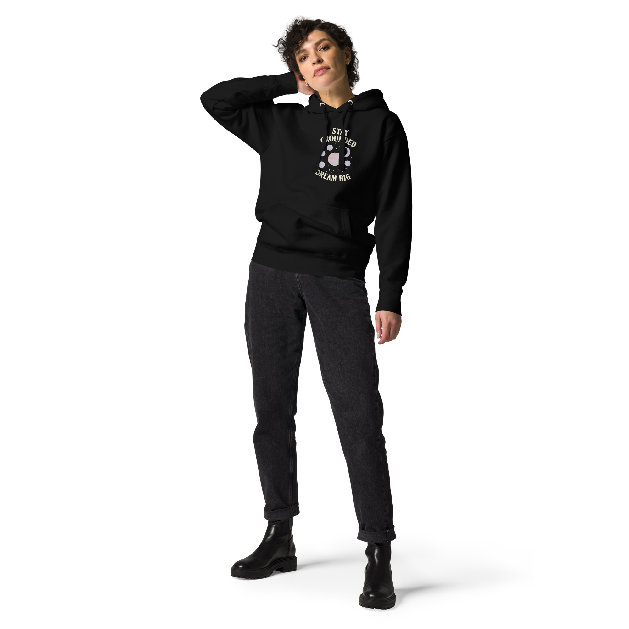 Woman wearing black stay grounded dream big hoodie by orbit clothing - unisex